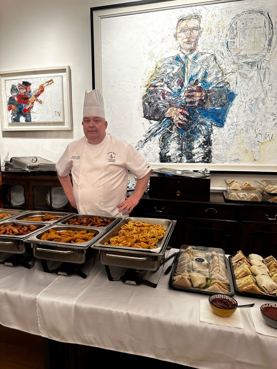 4C Head Chef Ciaran Dignam with a catering spread at a corporate event